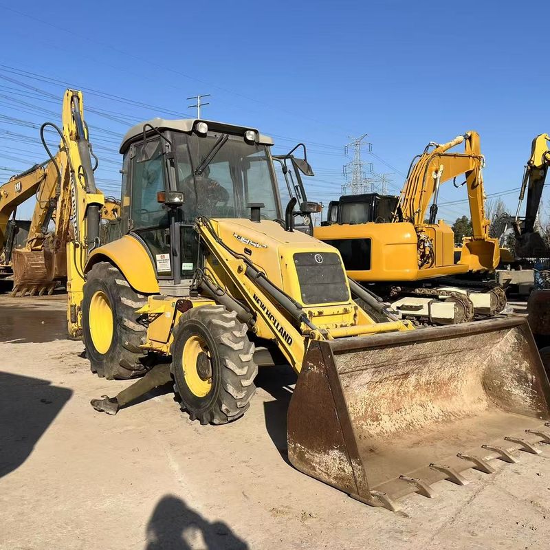 Couleur d'origine New Holland LB85 chargeuse à pelle à roues motrices en bon état