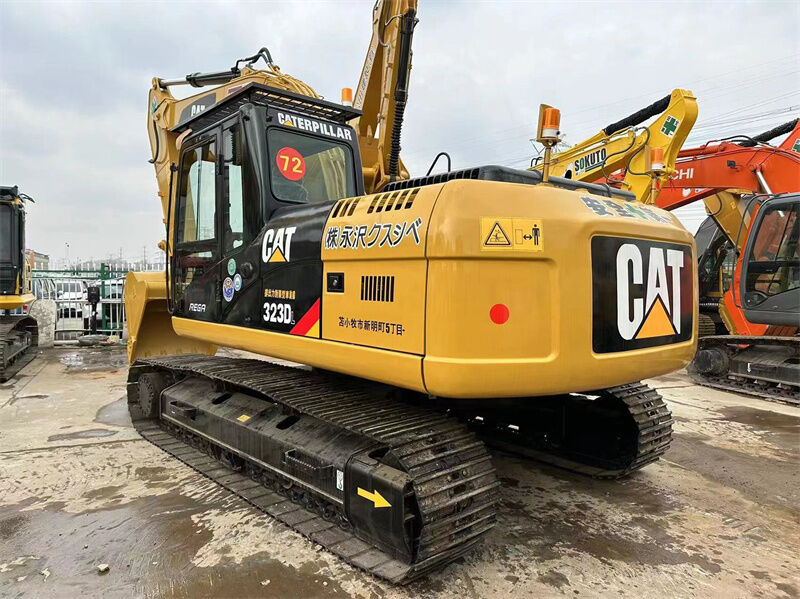 Excavatrice Caterpillar Cat 320DL d'occasion, de taille moyenne, conçue pour une faible durée d'immobilisation à long terme et dans diverses conditions de travail